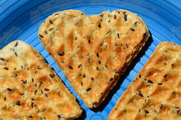Heart-shaped waffles on a blue plate