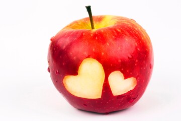 Apple with hearts on a white background
