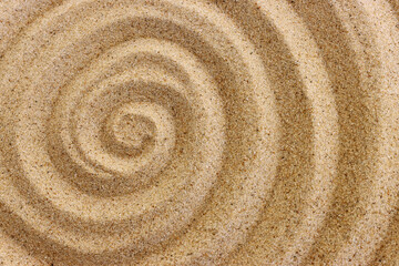 Fototapeta premium Top view image of beach sand background with patterns