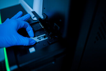 Production line pharmaceutical industry. Manufacturing of drugs and medications, pharmaceuticals. Technician, scientist works in a scientific laboratory	