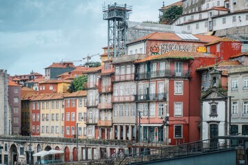 View of one of the most famous streets in the city of Porto, Portugal. Facades of buildings on an...