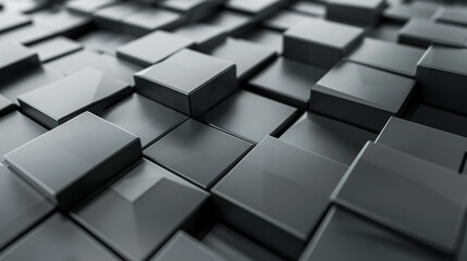 A close up of a black cube with a silver border. The cubes are arranged in a pattern and are all the same size