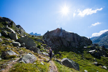Young hiker woman in Vall de Boi, Aiguestortes and Sant Maurici National Park, Spain