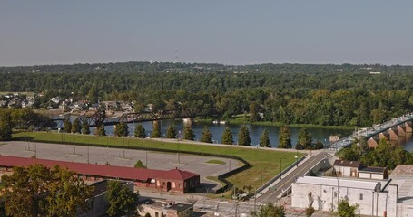 Augusta Georgia Aerial v22 low flyover Olde town capturing downtown cityscape, cars driving on Reynolds street and Freedom bridge crossing Savannah river - Shot with Inspire 3 8k - October 2023