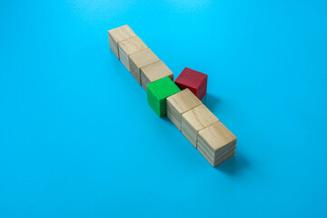 Succession or dismissal of an employee, replacement in the company. A line of cubes and one...