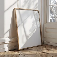 Picture of a wooden frame mockup leaning against a wall in a well-lit room with shadows. Mockup frame. Ratio 3x4.