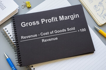 Notepad with Gross Profit margin gpm formula.
