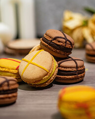 Colorful macarons and assorted sweets displayed on a table