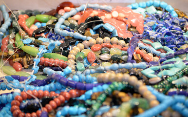 Selection of precious and semiprecious stones on the market. Beautiful natural crystal stone...