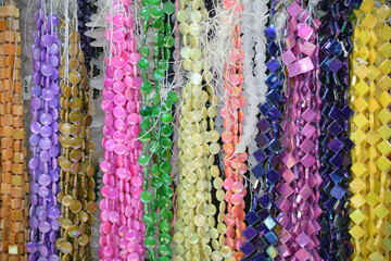 Selection of precious and semiprecious stones on the market. Beautiful natural crystal stone...