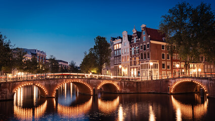 Amsterdam's Twilight: Lights and Reflections in the Historic Canal District