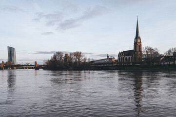 Scenic river view with a cathedral in the background in Frankfurt, Germany