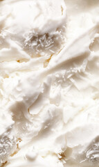 coconut ice cream surface close-up shot, a closeup of the coconut ice cream texture, highlighting its creamy white base with subtle coconut flakes