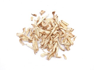 Dried ginger pieces scattered as a natural herbal ingredient for health and treatment on a blank white background