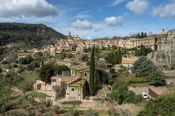 Fototapeta premium Scenic Valldemossa Town in Palma de Mallorca under a cloudy blue sky