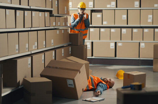 Unconscious injured worker lying on the floor