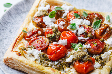 Pesto, tomato and feta tart.