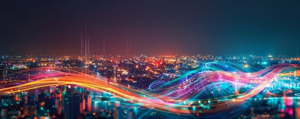 Vibrant city skyline at night with colorful light trails, representing modern technology, connectivity, and a bustling urban environment.