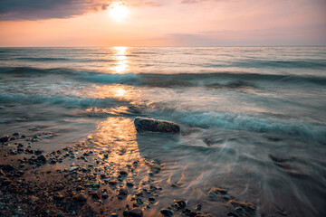 Sunset behind a water surface