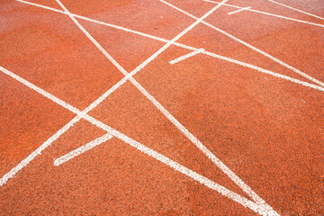 Bright red runway interweaves the straight white trajectory with the curved white trajectory.