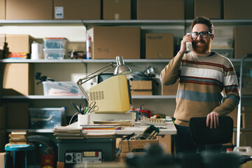 Vintage style nerd calling in the garage