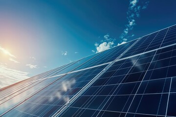 A solar panel is shown in the sky with the sun shining on it. Concept of energy and sustainability, as solar panels are a renewable source of power. The blue sky and the sun's rays create a bright