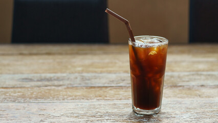 Ice americano coffee in a tall glass with ice cubes, Americano coffee or iced coffee without milk...