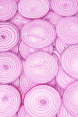Onion slices as a background. Top view.