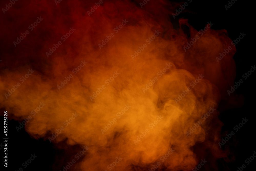 Wall mural orange and red steam on a black background.