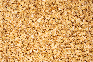 Oat-flakes as a background. Top view.