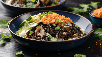 Korean mushrooms bowl with cucumber salad, kimchi and rice
