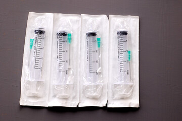 4 sterile disposable syringe for single use in individual blister pack.