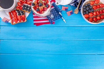 USA patriotic breakfast or brunch with american flag decorated oatmeal, layered yogurt granola...
