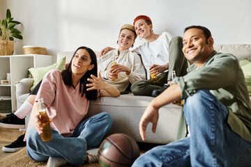 Diverse group of friends, including a loving lesbian couple, sitting on top of a couch, enjoying quality time together at home.