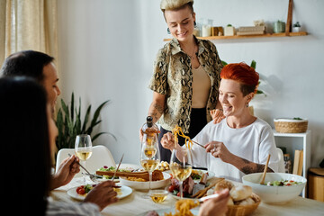 Diverse group enjoying a meal together at a table.