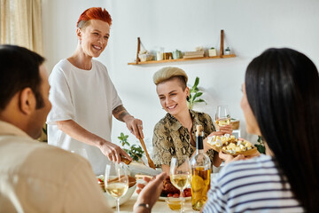 Diverse group enjoys food and drinks with a loving lesbian couple at home.