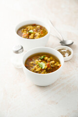 Healthy lentil soup with basil