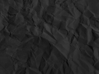 Fototapeta premium Crushed dark black paper surface