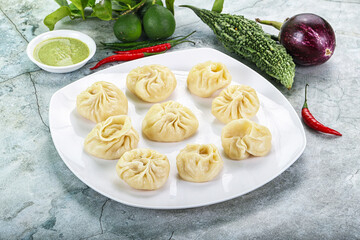 Nepali steamed dumplings  Momo with sause