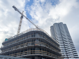 Construction site with tower crane.  Home renovation. Build new home
