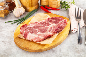 Raw pork neck steak for grill