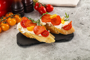 Bruschetta tapas with chorizo and tomato
