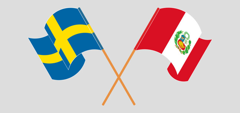 Crossed and waving flags of Sweden and Peru