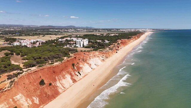 View of the Praia da Falesia with its unique multicolored cliffs, Algarve region