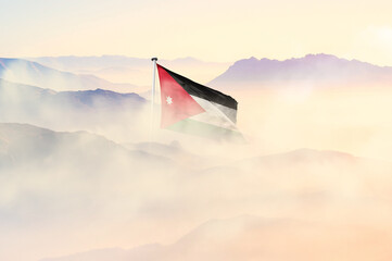 Jordan flag disappears in beautiful clouds with fog.