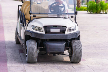 open electric golf cart for transporting tourists on Palm Jumeirah