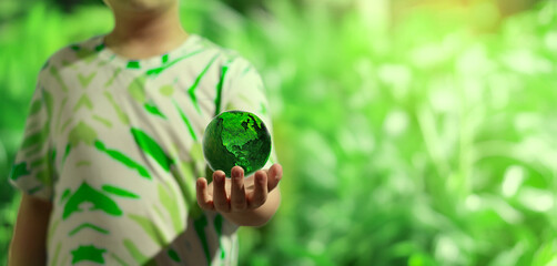 kid hold green globe