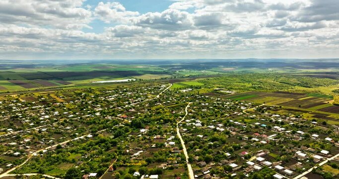 Aerial drone view of Pelinia, Drochia, Moldova with a cloudy sky