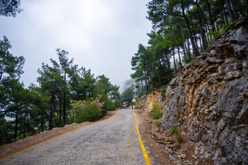 Road trip, view from car along to mountain roads and serpentines in mountain near Fethiye, Turkey