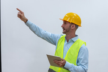 Portrait young Caucasian engineer man with safety helmet and vest on white background